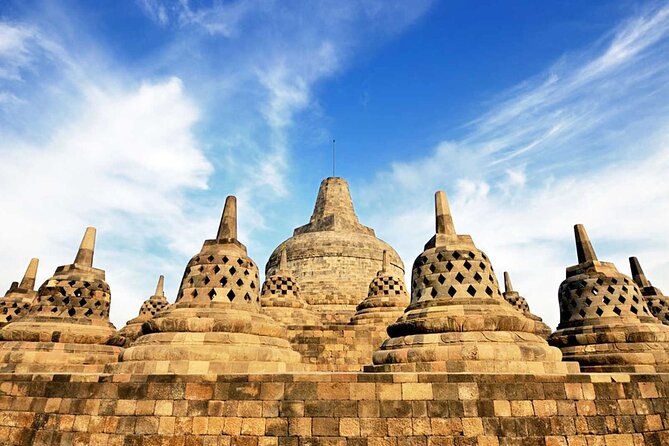 Yogyakarta: Borobudur Climb-up & Prambanan Day Trip All Inclusive - Borobudur: Climb-Up to the Seated Buddhas and Bell-Shaped Spires