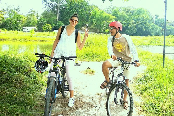 Yogyakarta Cycling Tour Around the Villages and Fish Farm - Getting started at Izzati Jogjatour: bikes, helmet, and a short warm-up